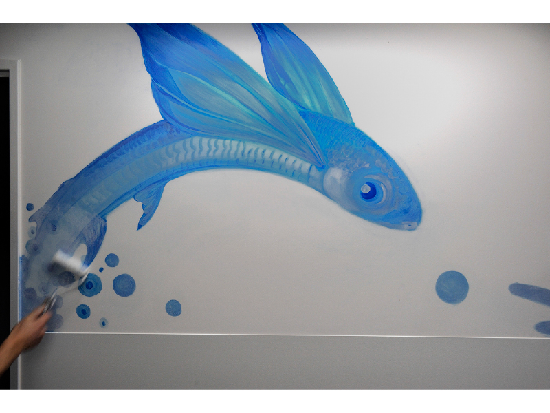 man having the back of his head shaved