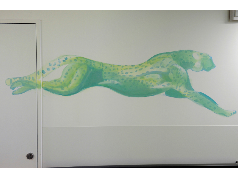 young boy sitting in barbers chair